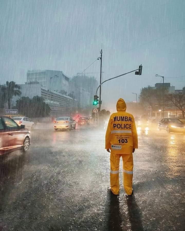 Mumbai Police in Mumbai Rain