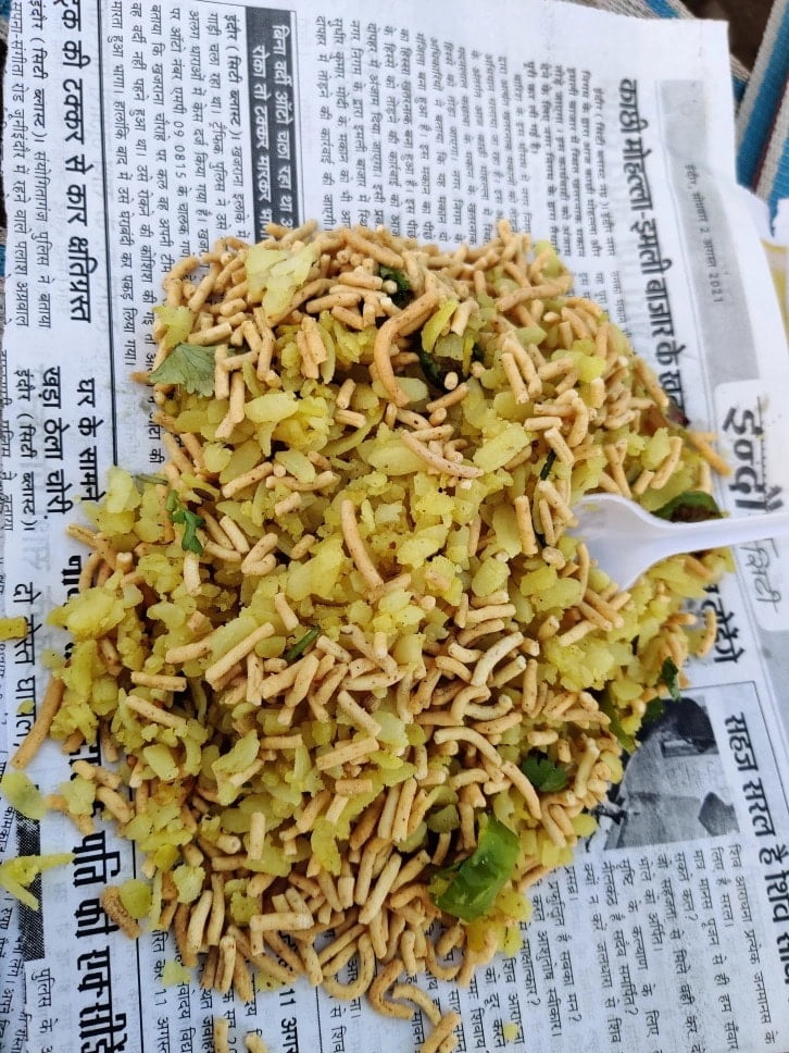 Indori Poha-Sev with newspaper from the Indore. What else?