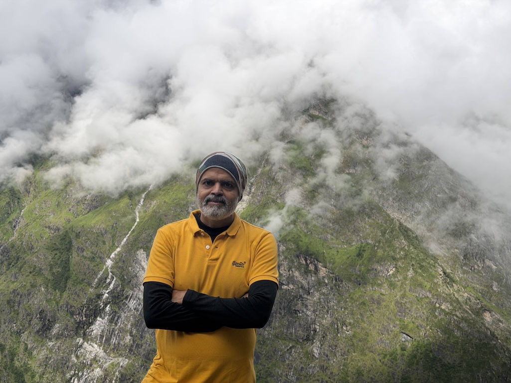 Three kilometres up, cloud spilling over the ridge